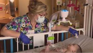 Nurse Caring For Baby